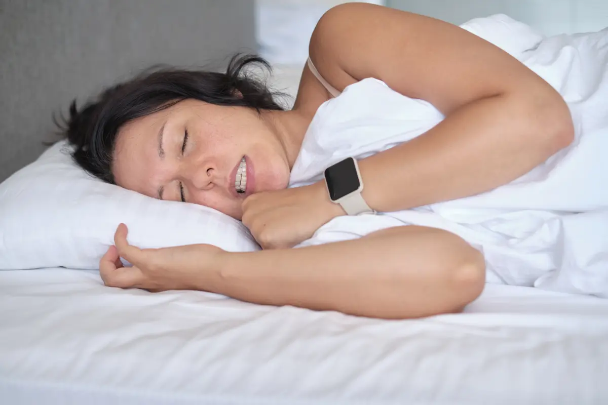 woman grinding teeth in sleep