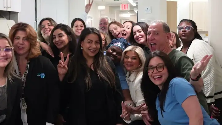 The Dental Care Group team smiling together
